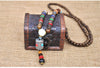 Collier "Symbole Bouddhiste Tibétain" en Bois Naturel - 9 modèles disponibles