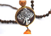Collier "Symbole Bouddhiste Tibétain" en Bois Naturel - 9 modèles disponibles