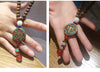Collier "Symbole Bouddhiste Tibétain" en Bois Naturel - 9 modèles disponibles