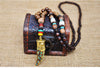Collier "Symbole Bouddhiste Tibétain" en Bois Naturel - 9 modèles disponibles
