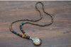 Collier "Symbole Bouddhiste Tibétain" en Bois Naturel - 9 modèles disponibles