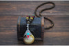 Collier "Symbole Bouddhiste Tibétain" en Bois Naturel - 9 modèles disponibles