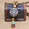 Collier "Symbole Bouddhiste Tibétain" en Bois Naturel - 9 modèles disponibles