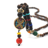 Collier "Symbole Bouddhiste Tibétain" en Bois Naturel - 9 modèles disponibles