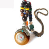 Collier "Symbole Bouddhiste Tibétain" en Bois Naturel - 9 modèles disponibles