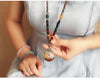 Collier "Symbole Bouddhiste Tibétain" en Bois Naturel - 9 modèles disponibles