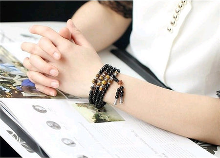 Bracelet Mala Bouddhiste Obsidienne/Oeil de Tigre